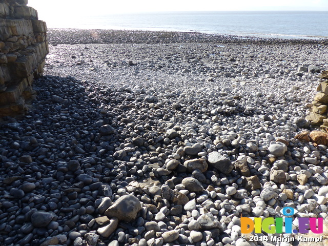 FZ001420 Pebbles washed up high after storms